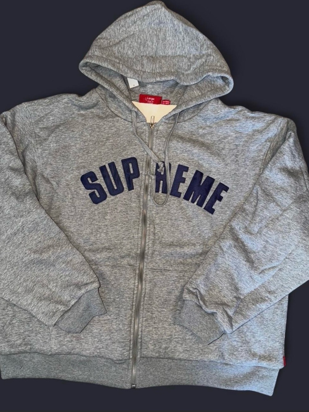 Supreme Grey Zip Hoodie with Red Tag and Navy Detail